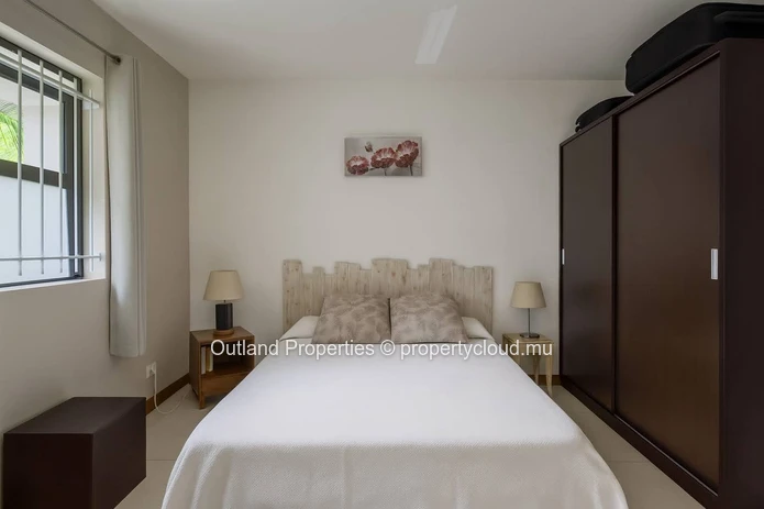 Appartement rez-de-chaussée, central, résidence avec piscine